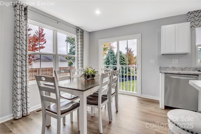 5995 Granbury Dr, Kannapolis, NC 28081 - dining room with light wood-style floors and baseboards