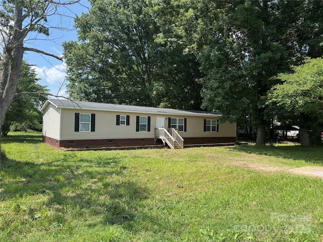 1555 Moore Rd, York, SC 29745 - manufactured / mobile home featuring crawl space and a front lawn