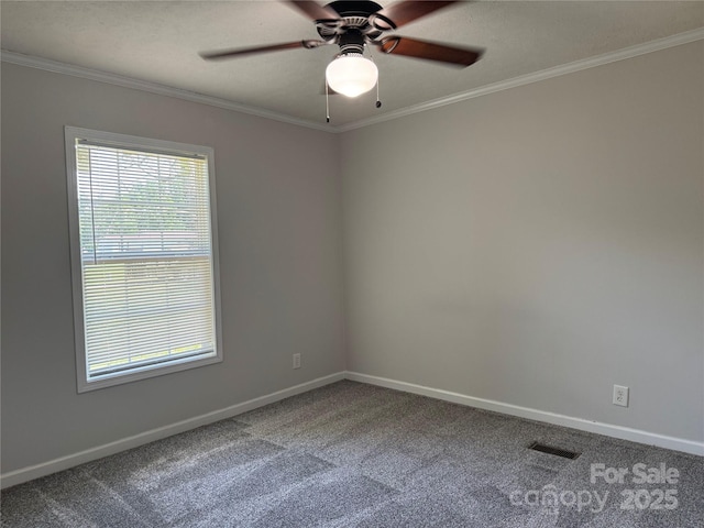 1555 Moore Rd, York, SC 29745 - empty room featuring carpet, ornamental molding, baseboards, and a ceiling fan