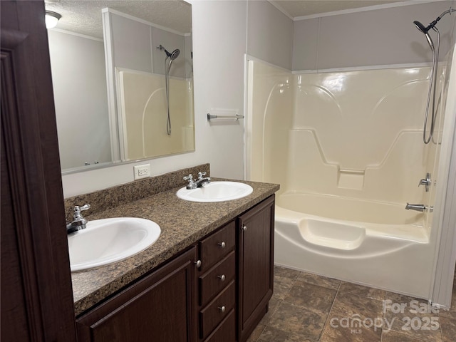 1555 Moore Rd, York, SC 29745 - full bath featuring  shower combination, double vanity, a textured ceiling, crown molding, and stone finish floors