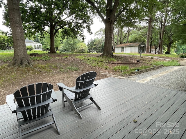 103 Boyd Dr, Stanley, NC 28164 - wooden terrace with an outbuilding