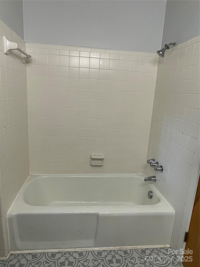 103 Boyd Dr, Stanley, NC 28164 - bathroom featuring shower / bath combination and tile patterned flooring