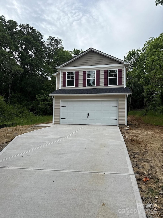 703 E Dunlap St, Lancaster, SC 29720 - view of front of home featuring a garage and driveway