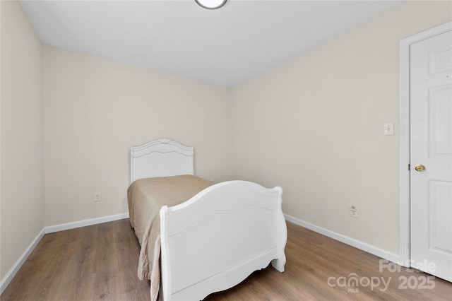 55 Gilbert B Crook Rd, Candler, NC 28715 - bedroom with wood finished floors