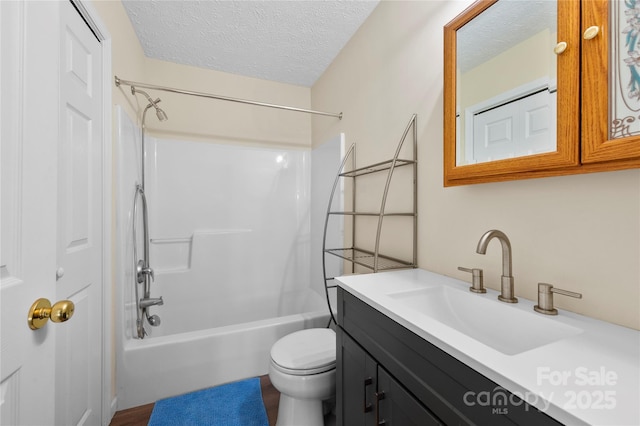55 Gilbert B Crook Rd, Candler, NC 28715 - full bathroom featuring vanity, shower / tub combination, and a textured ceiling