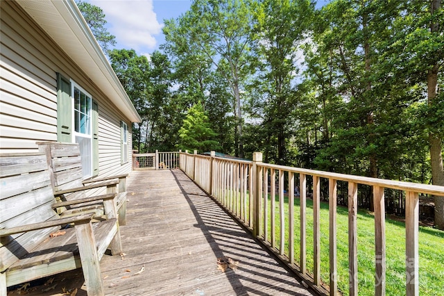 55 Gilbert B Crook Rd, Candler, NC 28715 - wooden deck with a yard and view of wooded area