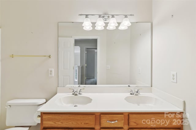 2321 Oberwood Dr, Charlotte, NC 28270 - bathroom with double vanity and toilet