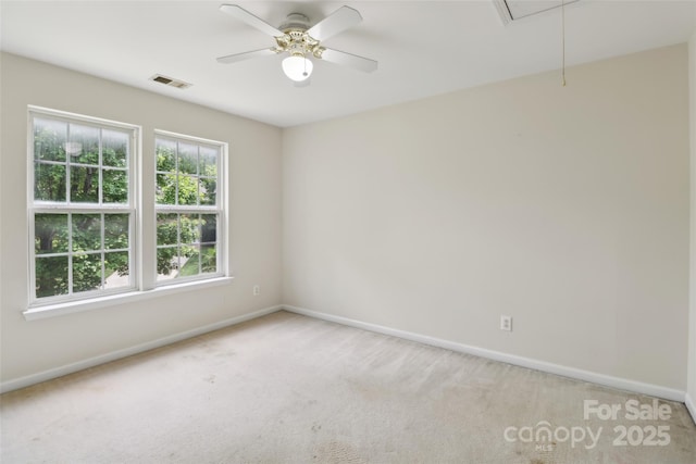2321 Oberwood Dr, Charlotte, NC 28270 - empty room featuring attic access, light colored carpet, and ceiling fan