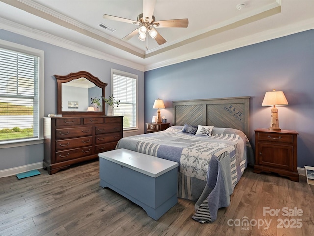 177 Yellow Birch Loop, Mooresville, NC 28117 - bedroom featuring a raised ceiling, crown molding, baseboards, wood finished floors, and a ceiling fan