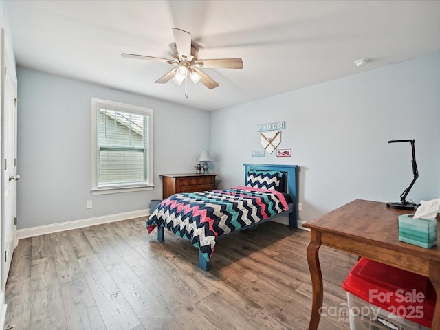 177 Yellow Birch Loop, Mooresville, NC 28117 - bedroom featuring wood finished floors, baseboards, and a ceiling fan