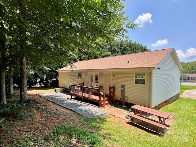 1031 Daniel Dr, Stanley, NC 28164 - rear view of house featuring a deck, a yard, crawl space, and a shingled roof