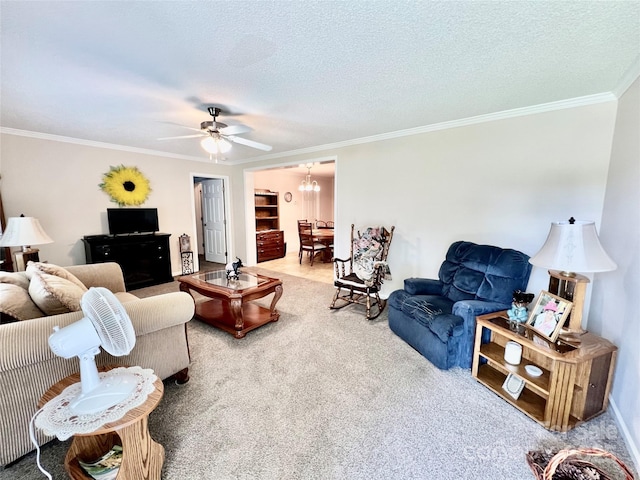 1031 Daniel Dr, Stanley, NC 28164 - living room featuring ceiling fan, ornamental molding, carpet, a chandelier, and a textured ceiling