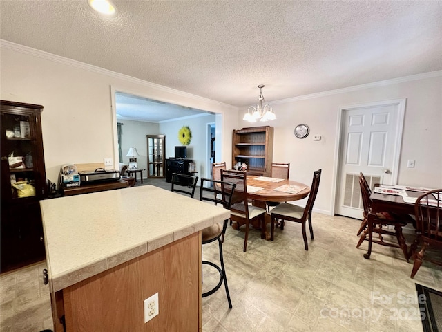 1031 Daniel Dr, Stanley, NC 28164 - dining room with a chandelier, crown molding, and a textured ceiling