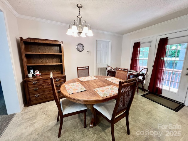 1031 Daniel Dr, Stanley, NC 28164 - dining area with a chandelier, ornamental molding, and a textured ceiling