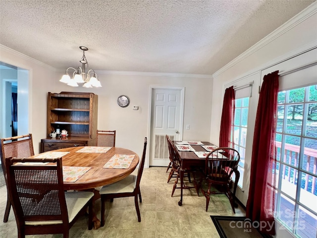 1031 Daniel Dr, Stanley, NC 28164 - dining area featuring a chandelier, crown molding, and a textured ceiling