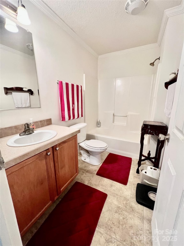 1031 Daniel Dr, Stanley, NC 28164 - bathroom with vanity, crown molding, toilet, washtub / shower combination, and a textured ceiling