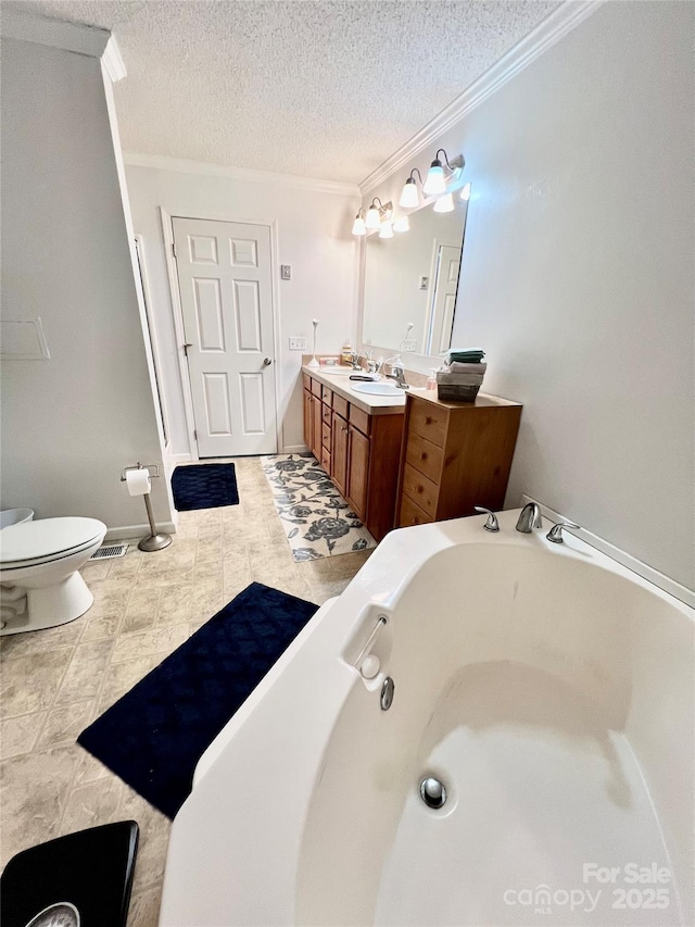 1031 Daniel Dr, Stanley, NC 28164 - full bath with crown molding, vanity, a garden tub, a textured ceiling, and toilet