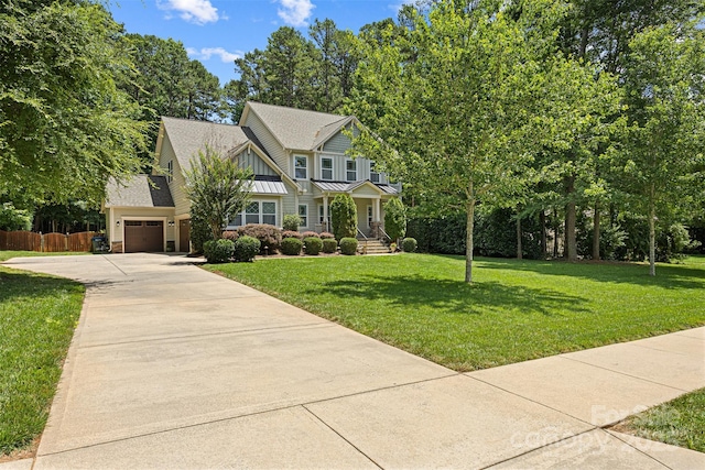 6422 Northern Red Oak Dr, Mint Hill, NC 28227 - craftsman inspired home with driveway, a standing seam roof, an attached garage, and a metal roof