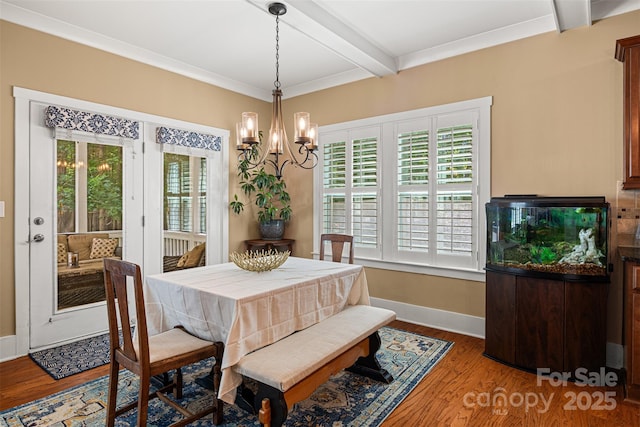 6422 Northern Red Oak Dr, Mint Hill, NC 28227 - dining space with beam ceiling, healthy amount of natural light, a chandelier, and wood finished floors