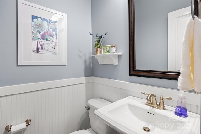 6422 Northern Red Oak Dr, Mint Hill, NC 28227 - bathroom featuring a wainscoted wall and a sink