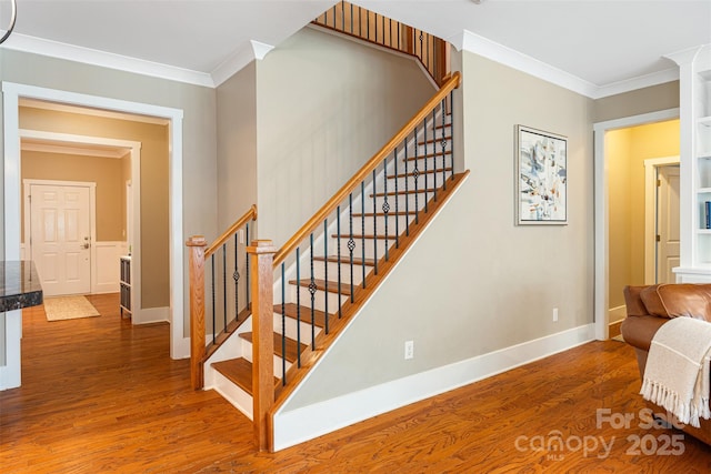 6422 Northern Red Oak Dr, Mint Hill, NC 28227 - stairway with wood finished floors and ornamental molding