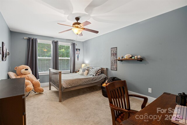 6422 Northern Red Oak Dr, Mint Hill, NC 28227 - bedroom with carpet floors, a ceiling fan, and an office area