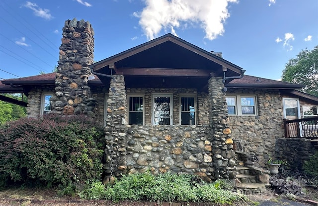 4320 Pisgah Dr, Canton, NC 28716 - view of property exterior featuring stone siding, a chimney, and a shingled roof