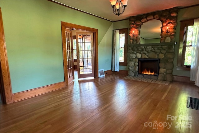 4320 Pisgah Dr, Canton, NC 28716 - unfurnished living room featuring baseboards, wood finished floors, a fireplace, and ornamental molding
