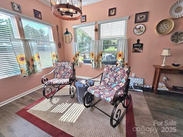 16115 Commodore Dr, Lancaster, SC 29720 - living area with a chandelier, wood finished floors, and baseboards