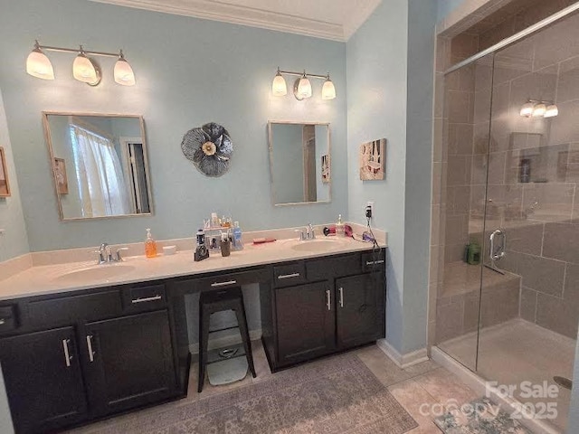 16115 Commodore Dr, Lancaster, SC 29720 - full bath featuring crown molding, double vanity, a stall shower, and tile patterned flooring