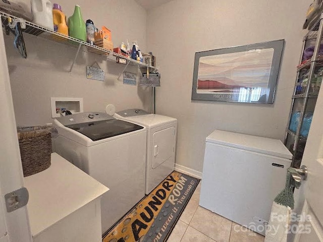 16115 Commodore Dr, Lancaster, SC 29720 - washroom with washer and clothes dryer and light tile patterned flooring