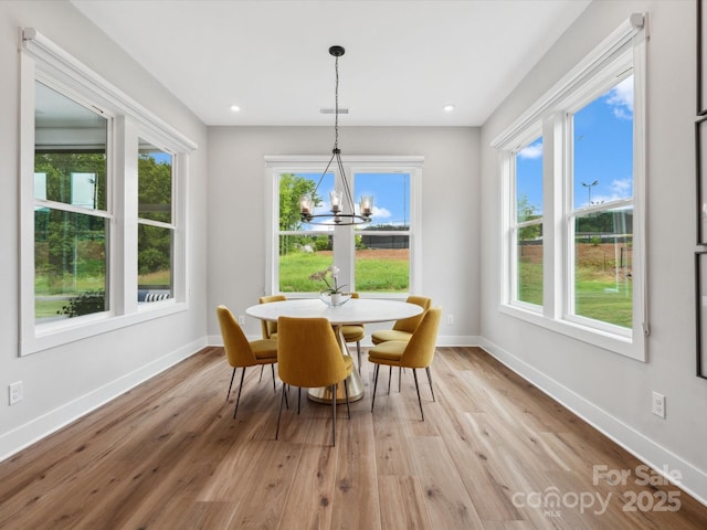 6020 Waldorf Ave, Monroe, NC 28110 - dining room featuring a chandelier, healthy amount of natural light, light wood-type flooring, and recessed lighting