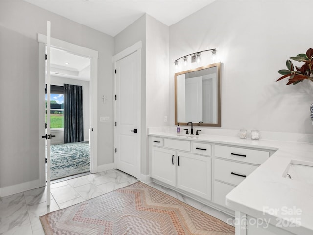 6020 Waldorf Ave, Monroe, NC 28110 - full bathroom featuring double vanity and marble look tiles