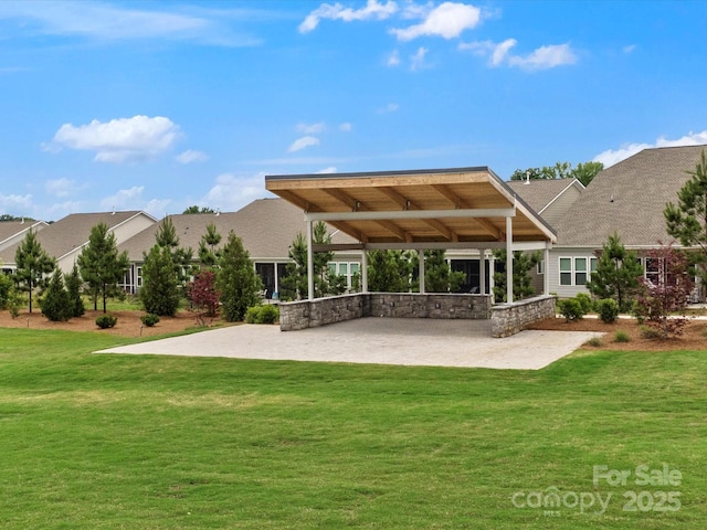 6020 Waldorf Ave, Monroe, NC 28110 - back of property featuring a patio area, a yard, and roof with shingles