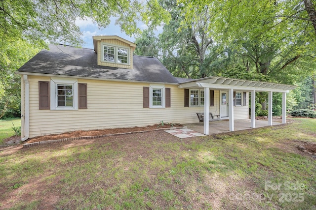 158 John Crotts Rd, Mocksville, NC 27028 - view of front of house with a patio area, a pergola, and a front lawn