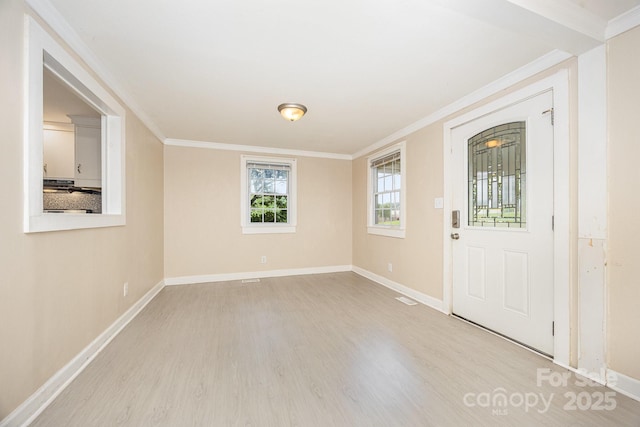 158 John Crotts Rd, Mocksville, NC 27028 - entrance foyer featuring wood finished floors, baseboards, and ornamental molding