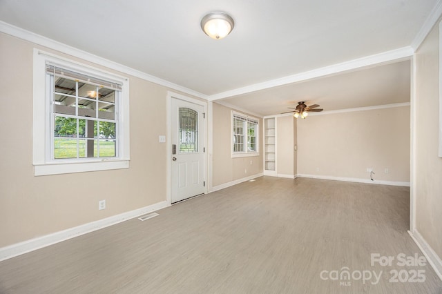 158 John Crotts Rd, Mocksville, NC 27028 - entryway featuring light wood-style floors, crown molding, baseboards, and a ceiling fan