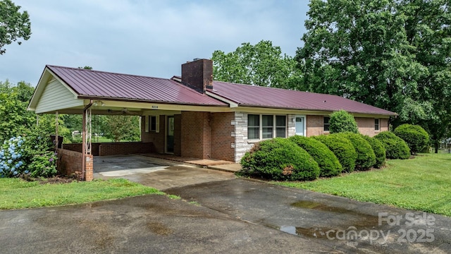 4214 Horseshoe Bend Rd, Hudson, NC 28638 - ranch-style home featuring driveway, a chimney, an attached carport, and metal roof