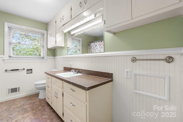4214 Horseshoe Bend Rd, Hudson, NC 28638 - full bath featuring a wainscoted wall, toilet, and vanity