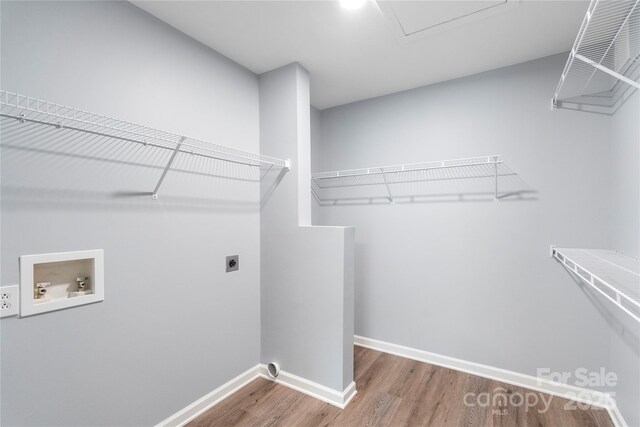 2045 Pin Oak Pl, Cramerton, NC 28032 - laundry area featuring electric dryer hookup, wood finished floors, and washer hookup
