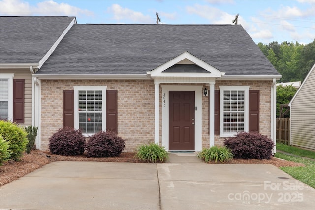 2045 Pin Oak Pl, Cramerton, NC 28032 - view of front facade featuring roof with shingles and brick siding