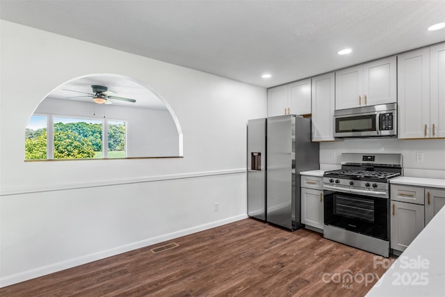 4980 Murray Rd, Winston Salem, NC 27106 - kitchen with appliances with stainless steel finishes, dark wood-type flooring, light countertops, a ceiling fan, and recessed lighting