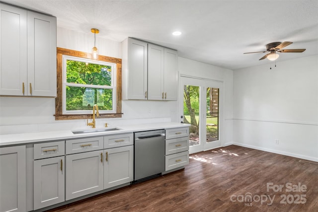 4980 Murray Rd, Winston Salem, NC 27106 - kitchen featuring dishwasher, a sink, gray cabinets, a ceiling fan, and dark wood-style flooring