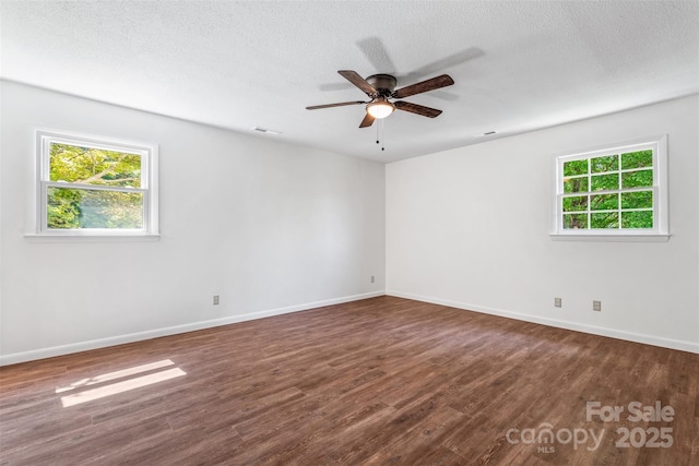 4980 Murray Rd, Winston Salem, NC 27106 - empty room featuring wood finished floors, baseboards, a ceiling fan, and a textured ceiling