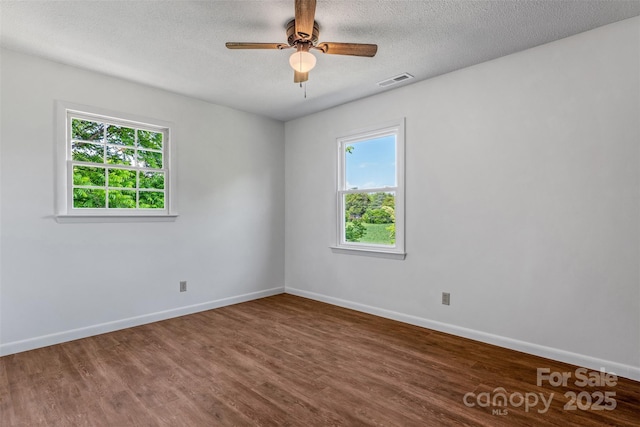 4980 Murray Rd, Winston Salem, NC 27106 - empty room featuring wood finished floors, baseboards, a ceiling fan, and a textured ceiling