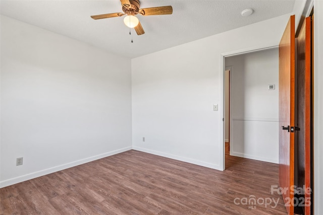 4980 Murray Rd, Winston Salem, NC 27106 - empty room with wood finished floors, ceiling fan, baseboards, and a smoke detector