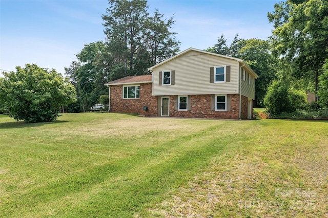 4980 Murray Rd, Winston Salem, NC 27106 - back of property featuring a yard and brick siding