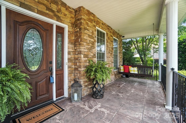 5916 Four Wood Dr, Matthews, NC 28104 - view of exterior entry with covered porch