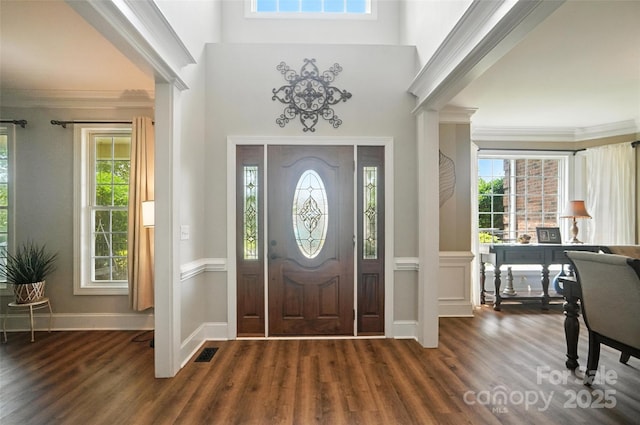 5916 Four Wood Dr, Matthews, NC 28104 - foyer entrance with dark wood-style floors and crown molding