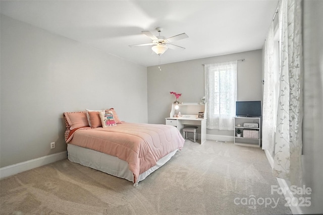 5916 Four Wood Dr, Matthews, NC 28104 - carpeted bedroom featuring baseboards and ceiling fan